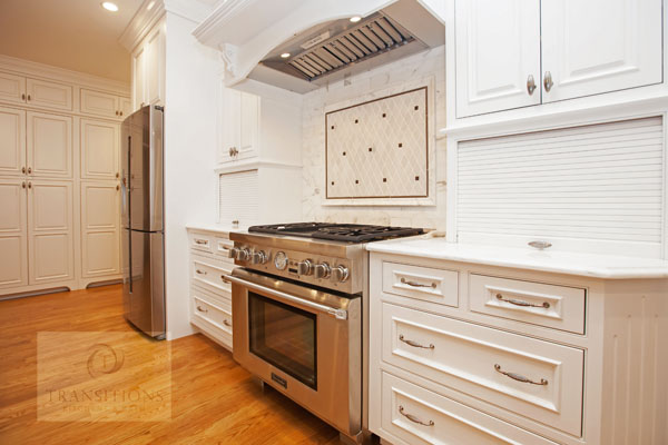 classic white kitchen design with marble backsplash