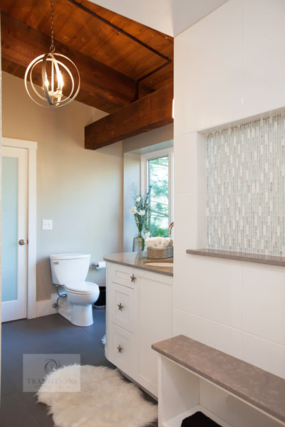 Bathroom design with gray tile floor