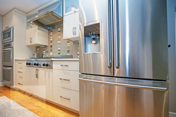 kitchen design with wall mounted stainless hood