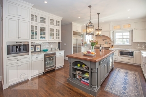 Traditional kitchen design with gray island