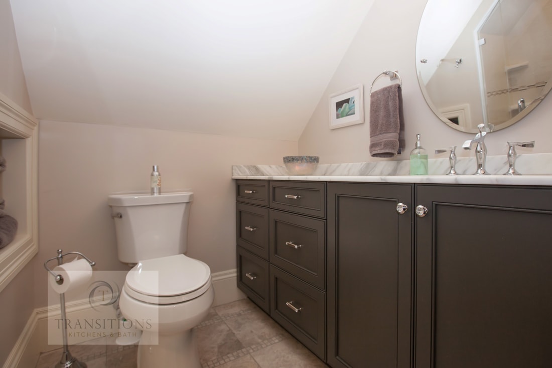 Hall bathroom design with two-piece toilet