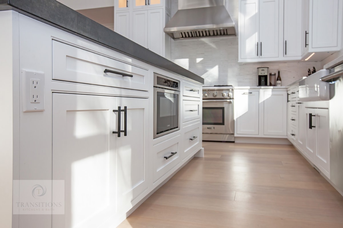 white kitchen design with hardwood floor