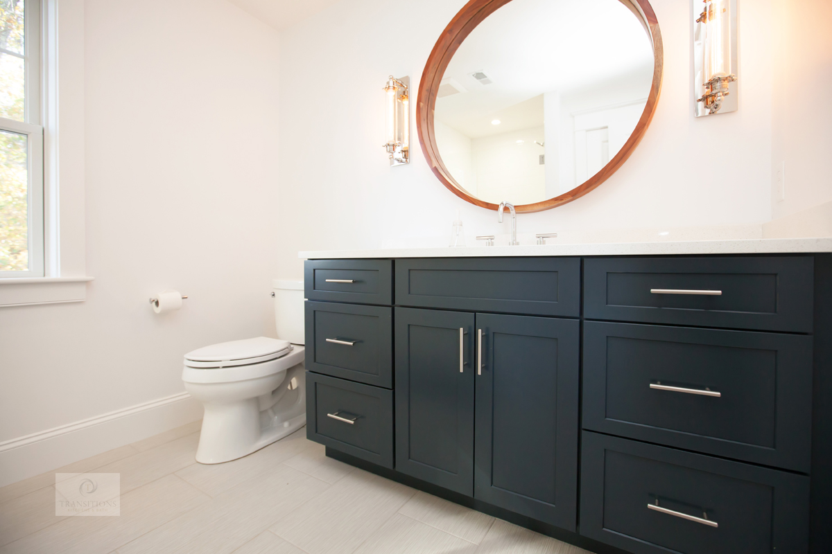 bath design with blue vanity