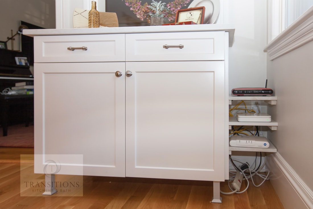 kitchen cabinet with electronics storage