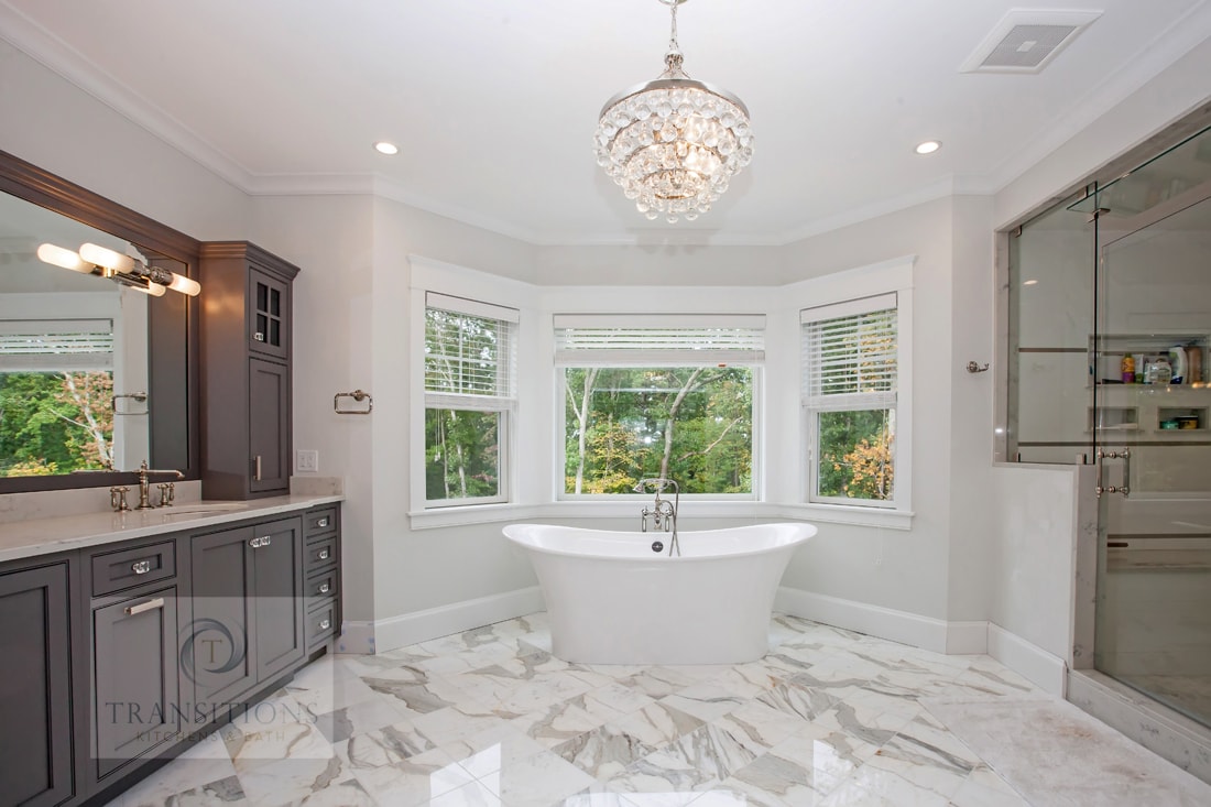 master bath with chandelier