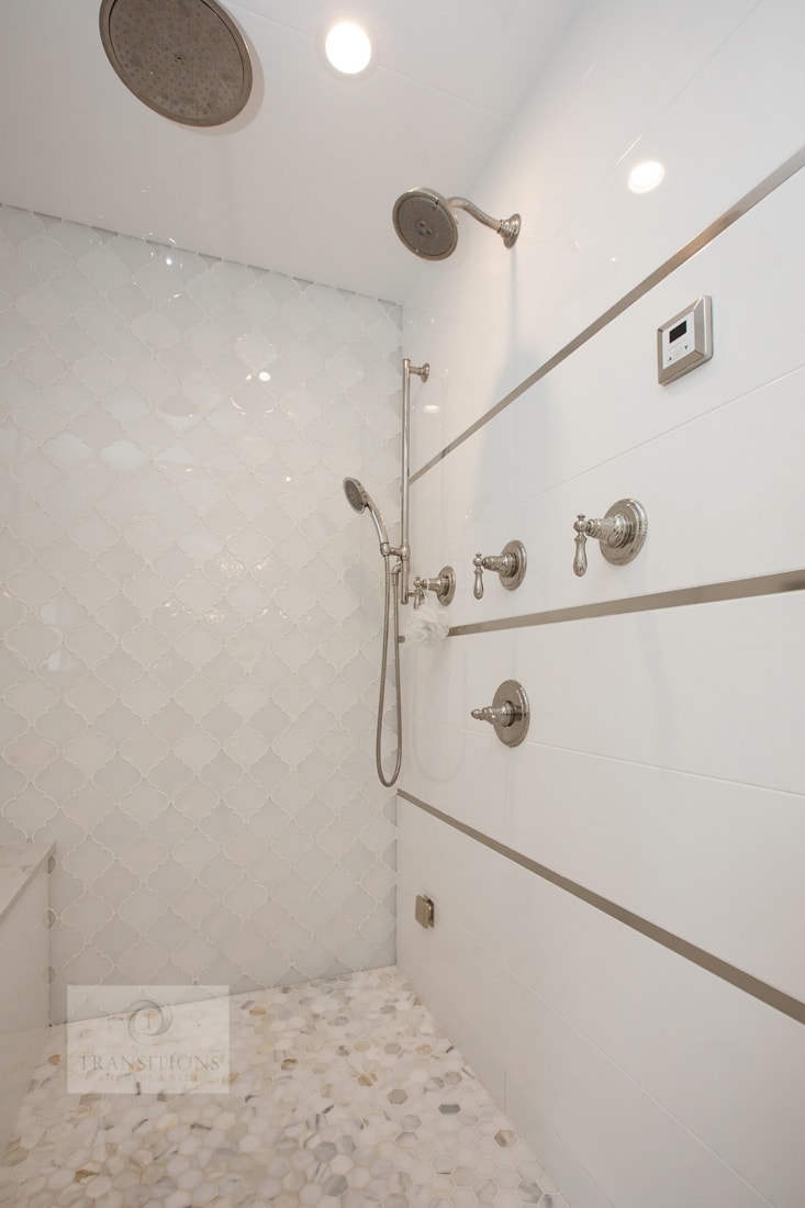 large shower with multiple showerheads