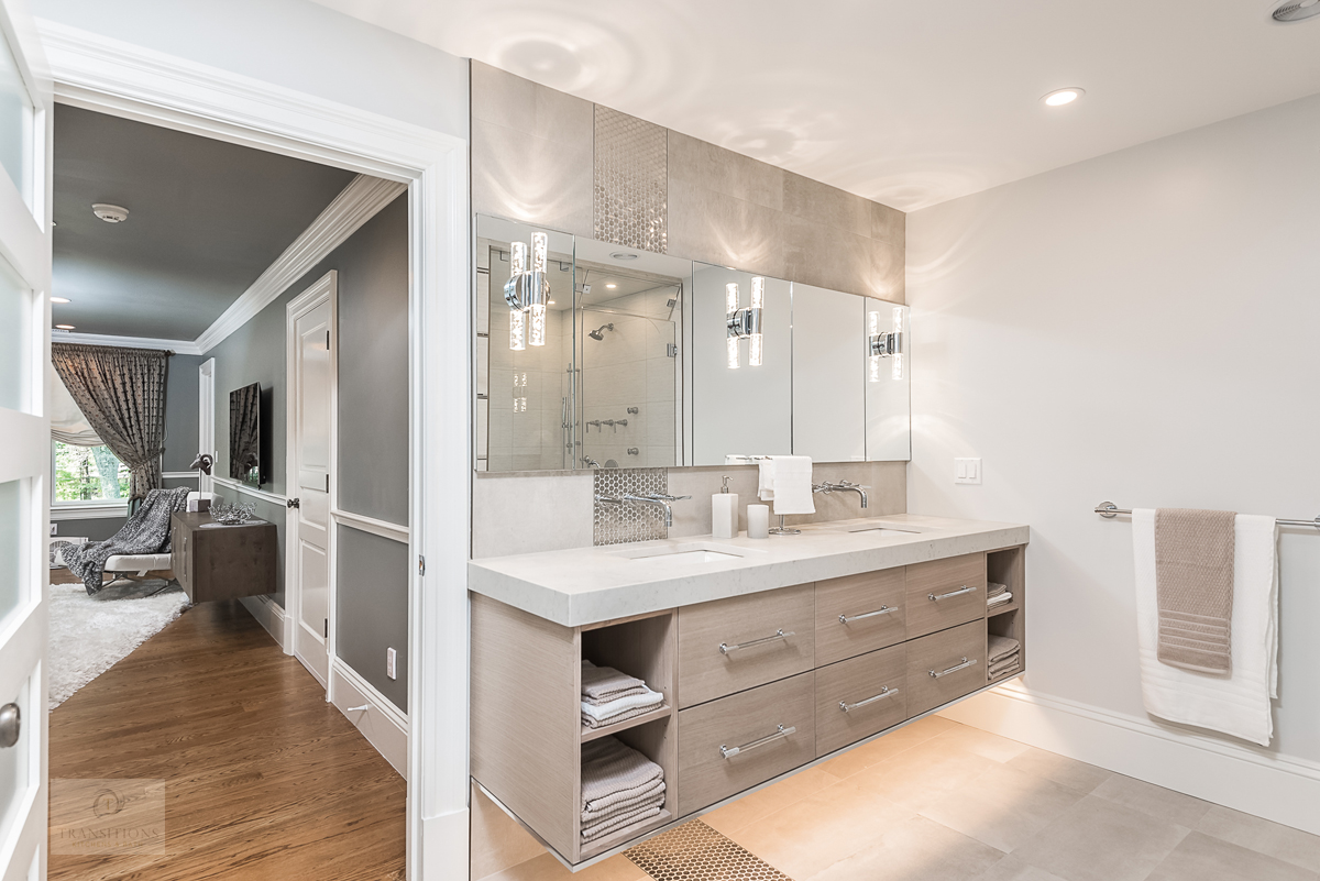 bathroom with wall mount vanity