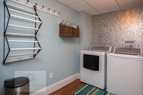 laundry room with a clothes rack